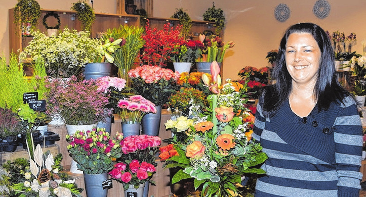 Sandra Hoffmann führt das Blumengeschäft in der Mall.